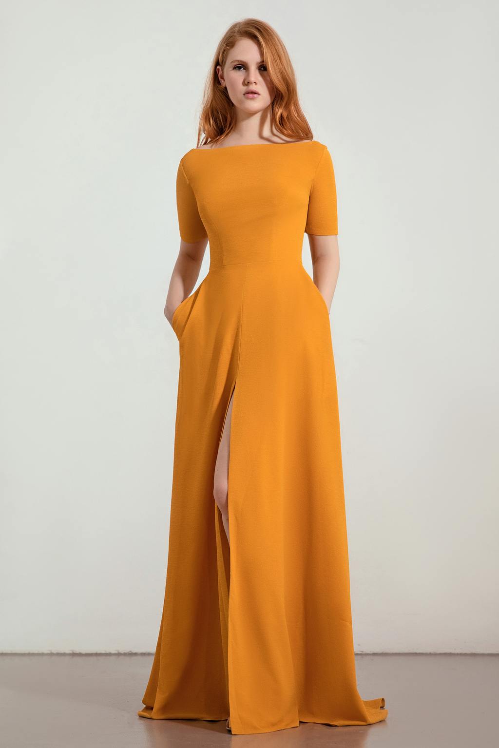 mustard yellow bridesmaid dress with boat neck and high slit